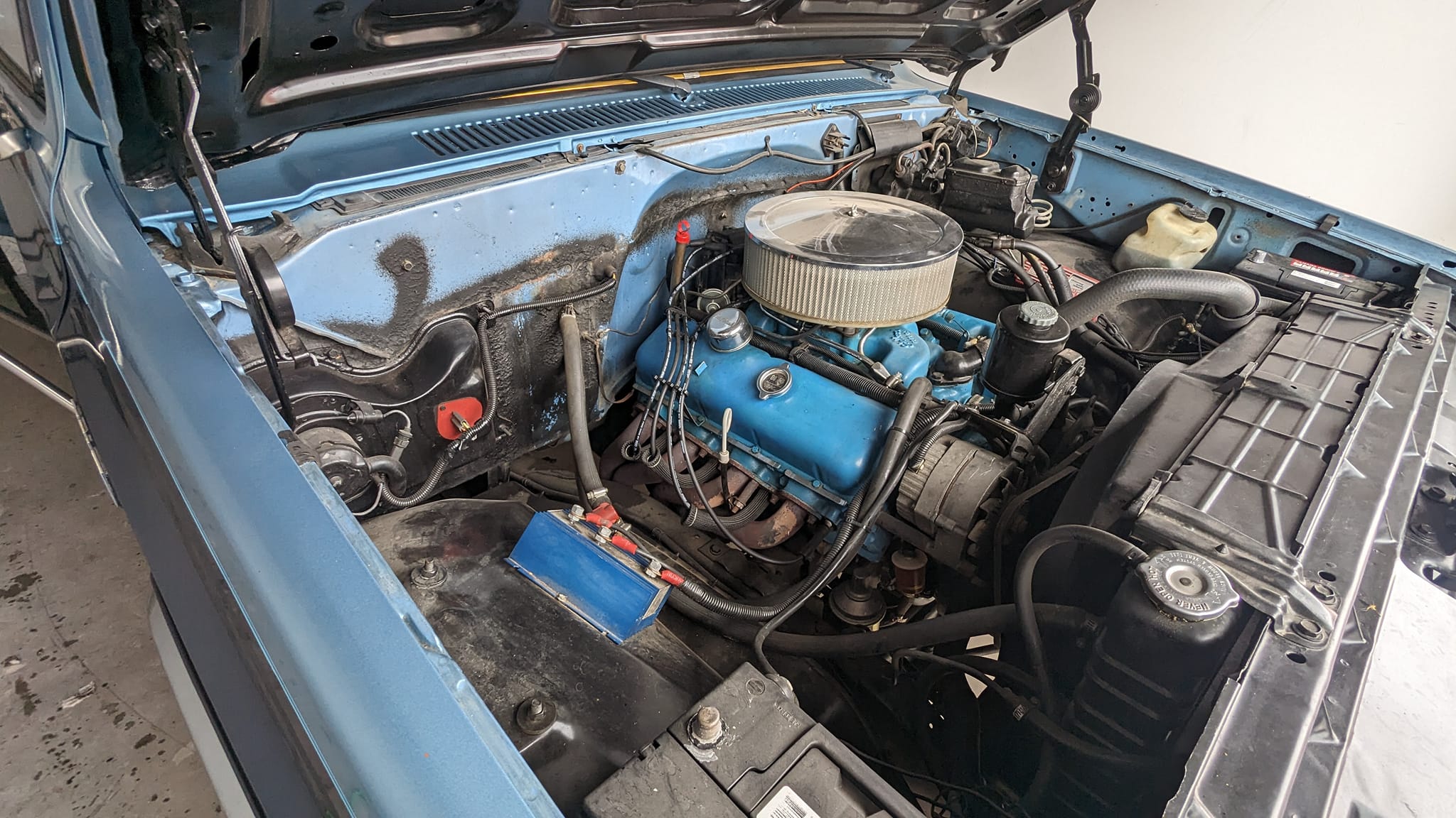 Blue truck under the hood