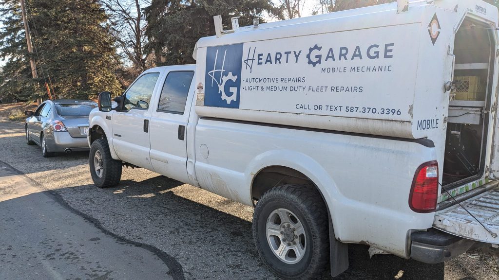 Mechanic truck with trees